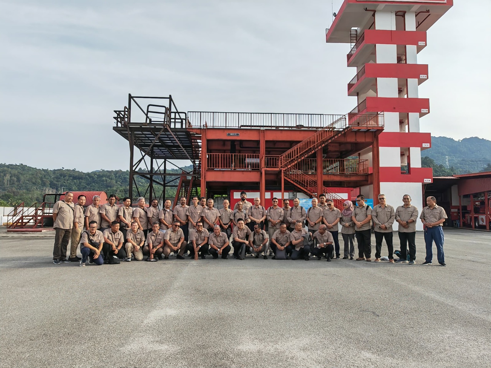 Otti course participants at the fire drill tower, Akademi Bomba dan Penyelamat Malaysia