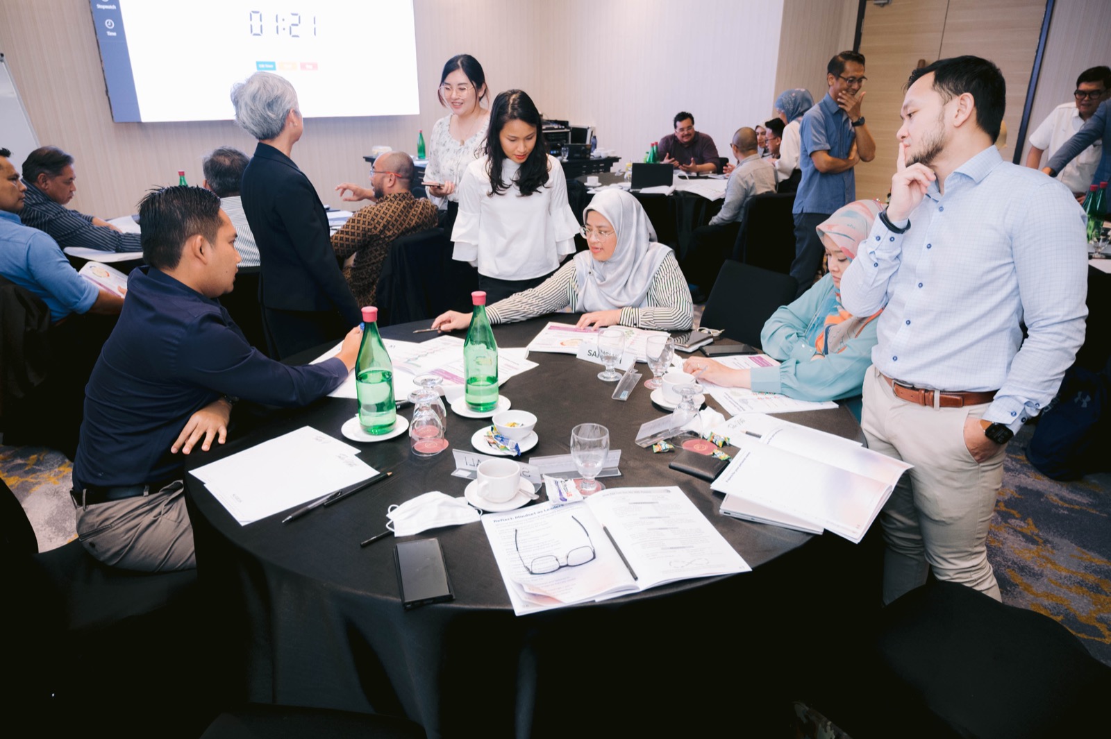 Participants collaborating in a brain-based Otti learning session
