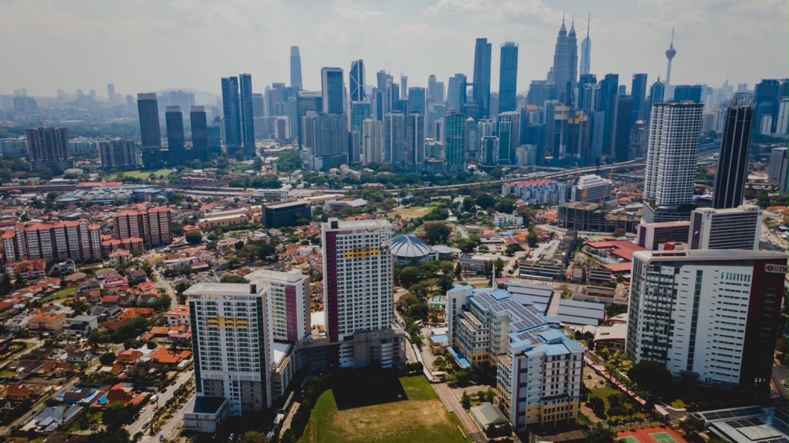 UTM Kuala Lumpur campus with the Kuala Lumpur skyline behind it