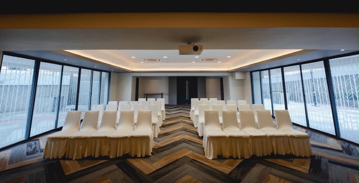 Bright training hall with floor-to-ceiling windows